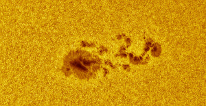 The pixel size comparison of two ASI cameras - Sunspot AR2665